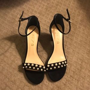 New condition black heels with pearl detail
